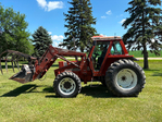 Hesston 8090 DT FWA with loader&grapple