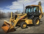 2000 John Deere 310E loader backhoe